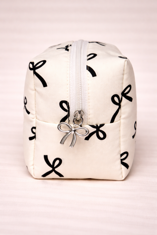 Necessaire bege laços pretos
